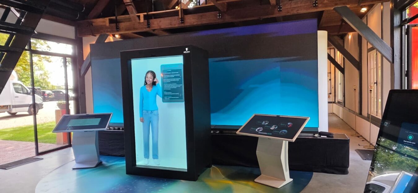 Digitale eventopstelling van Concentrix met videowall, kiosks en maatwerkdisplay